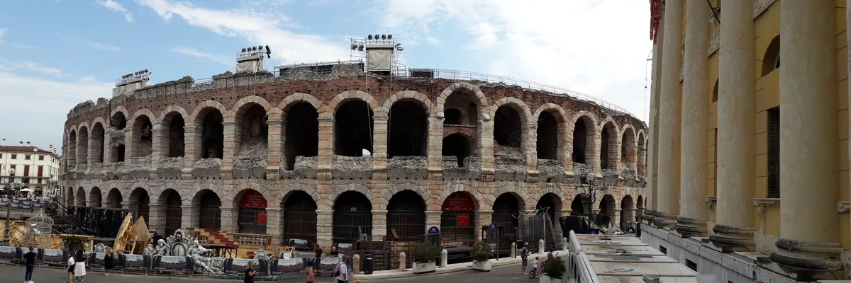The Roman arches of the Arena di Verona exterior in daylight